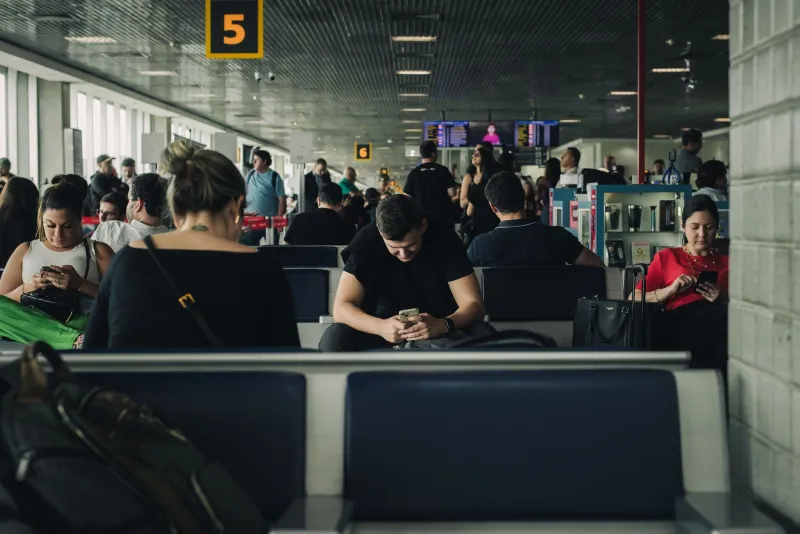 Stuck in Line, Ready to Spin: How America's Waiting Rooms Became the Golden Hour of Slot Play